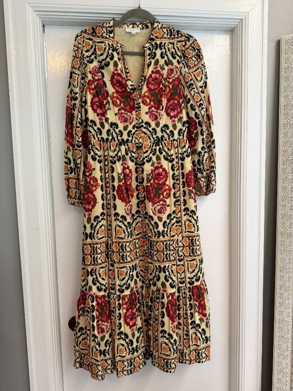a loves a floral boho dress, size S